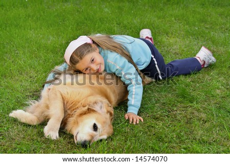 Young girl and dog -  golden retriever