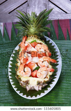 Shrimp with Pineapple, Onion, Paprika, Served in Half Pineapple