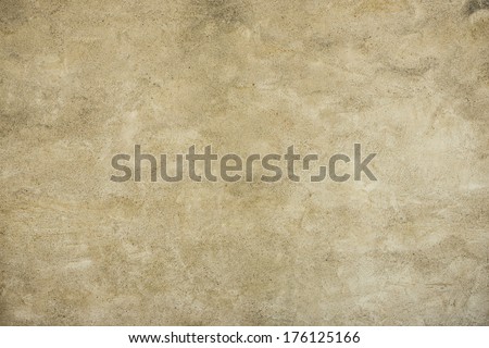 Seamless empty space background of vintage textured brown stone wall with rough weathered surface