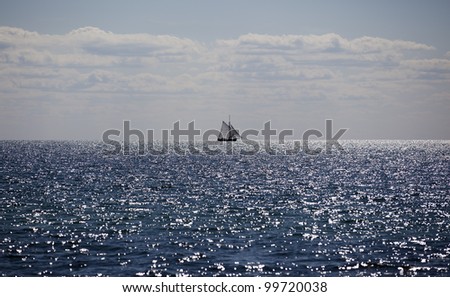 A traditional sailboat (cutter) on a calm and sunny ocean, Baltic Sea, Denmark