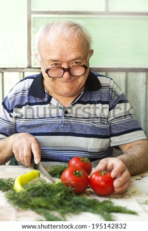 elderly man preparing healthy food