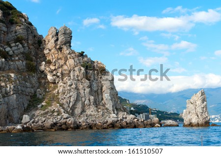 medieval knight\'s castle on a high cliff by the sea