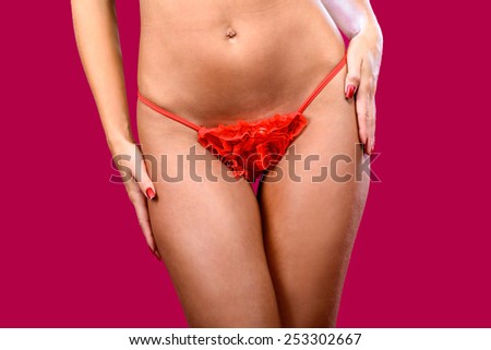A fragment of woman body in red panties / Lingerie / Underwear/Woman body shape/Female body/Woman body