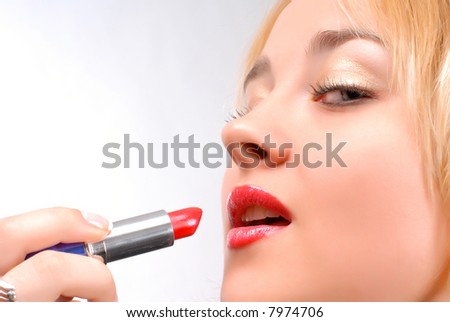 close-up beautiful shiny pink glamour lips and lipstick