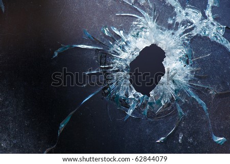 Photo Broken Window Looks Like A Bullet Hole - 62844079 : Shutterstock