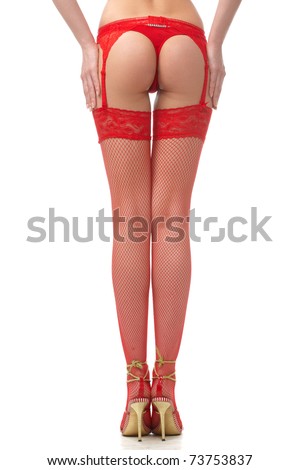 Half body shot of back sexy slender female legs in red underwear, stockings and high heels on whit background