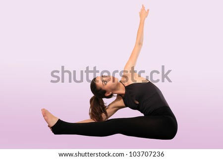 yoga instructor isolated on a pink background
