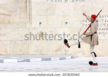 The Greek Presidential guard called Tsoliades dressed in traditional uniform at the monument of the unknown soldier in front of the Greek  parliament,Athens 11th May 2014