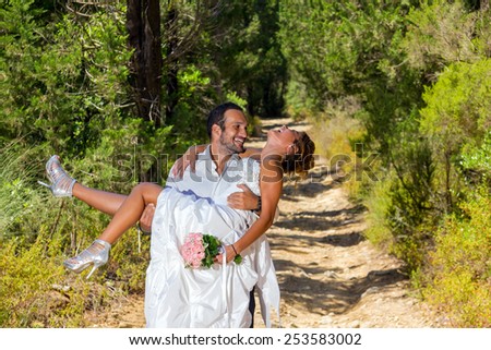 portrait of a bride and groom in a greek island on their wedding day