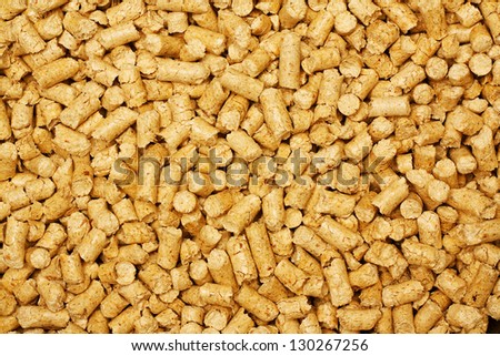 wood chip pellets a renewable source of energy becoming popular as a green environmentally friendly fuel for stoves which provide household heating