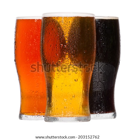 Different chilled refreshing pints of Beer, lager and stout served by the Alcoholic drinks industry