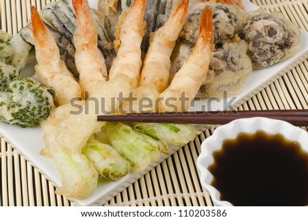 Tempura - Japanese deep fried prawns and assorted vegetables (shiitake mushrooms, peppers, spring onions, aubergine, broccoli and bamboo shoots) served with tentsuyu dipping sauce.