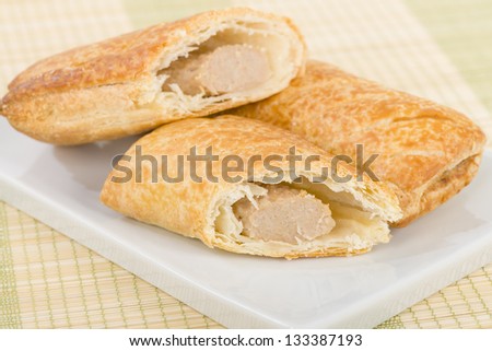 Sausage Rolls - Freshly baked sausage rolls - sausage meat wrapped in puff pastry.