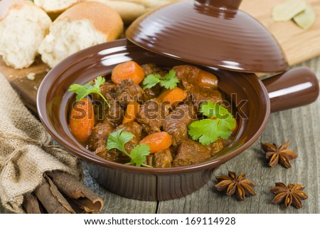 Bo Kho - Vietnamese beef stew cooked with lemongrass, star anise, bay leaf and cassia bark served with crusty bread.