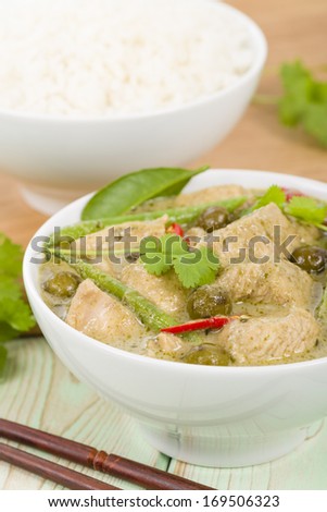 Gaeng Khiao Wan Gai - Thai green chicken curry with baby aubergines and snake beans served with steamed jasmine rice.