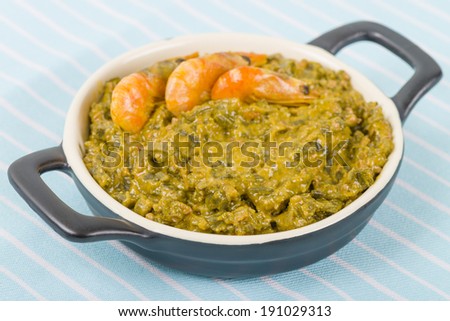 Caruru - Brazilian food made from okra, onion, shrimp, palm oil and toasted peanuts and cashews. Typical food from Bahia