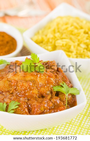 Quwarmah Al Dajaj - Kuwaiti curried chicken with saffron rice. Traditional Arab food.