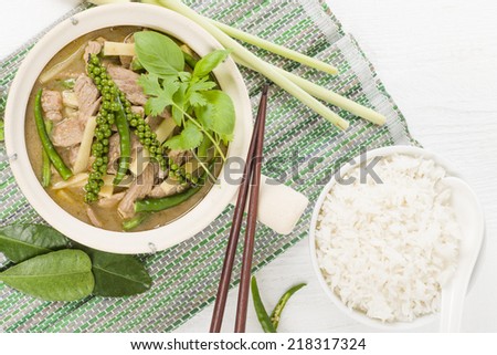 Jungle Curry (Kaeng Pa) - Northern Thai pork curry with young green pepper corns, chilis and snake beans. Served with boiled jasmine rice.