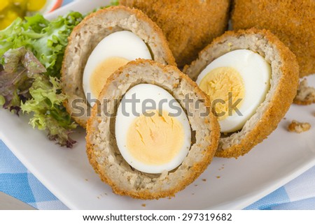 Scotch Egg - Hard-boiled egg wrapped in sausage meat, coated in breadcrumbs and deep-fried.