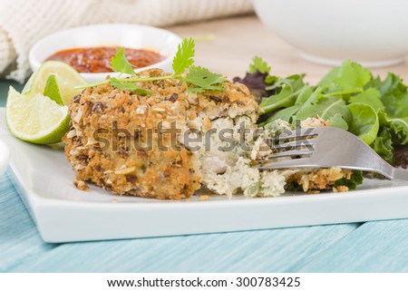 Fishcake - Deep-fried tuna, lime and coriander fishcake served with salad.
