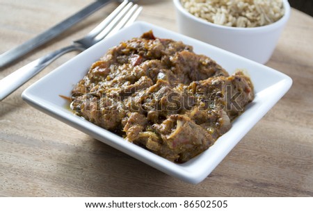 Lamb Curry & Rice  - Indian curry in white tableware