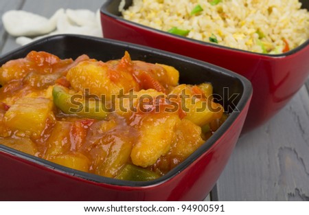Sweet and Sour Chicken & Egg Fried Rice - Chinese sweet and sour chicken served egg fried rice and prawn crackers.
