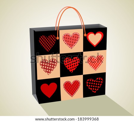 Black gift bag with hearts