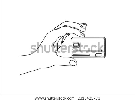 Continuous one line drawing of hand holding credit card. 