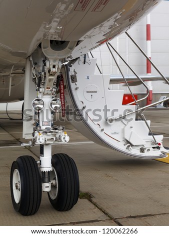 front landing gear and ladder light aircraft on the ground