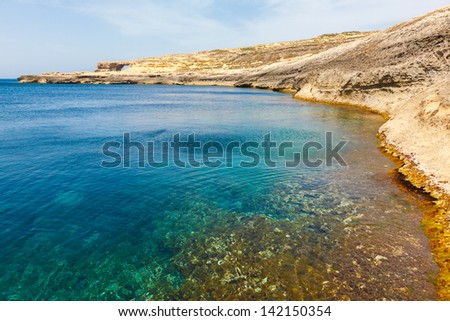 Azure Window and clear sea, famous stone arch of Gozo island in the sun in summer, Malta