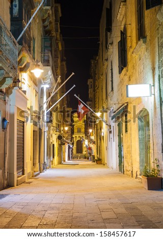 narrow old street in Valletta in a warm summer night