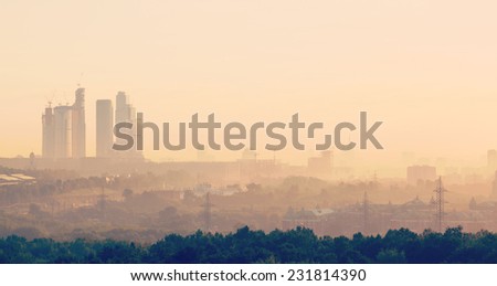 summer dawn and the view of the skyscrapers of Moscow City and the Stalinist high-rise buildings