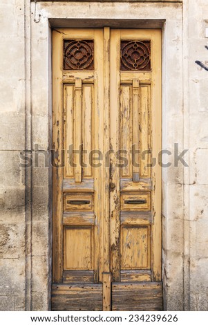old vintage wooden door in a house on the island of Sardinia, Italy