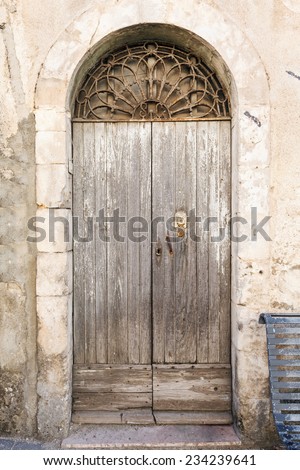 old vintage wooden door in a house on the island of Sardinia, Italy