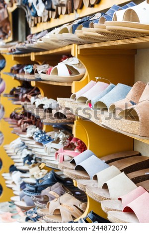 Street shoe shop with summer shoes in Florence