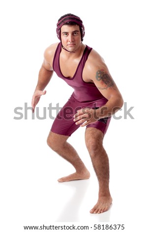 Young adult male wrestler. Studio shot over white.
