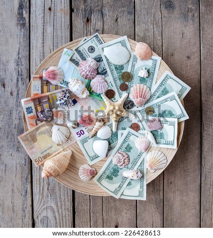 Seashells with money / holiday money