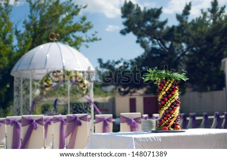 Fruit palm tree decoration on wedding banquet outdoor