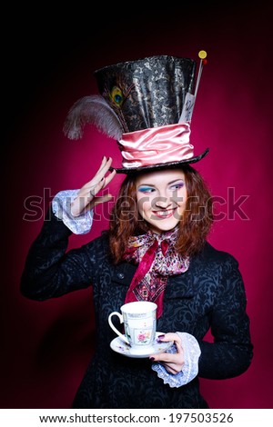Portrait of smiling young woman in the similitude of the Hatter (\