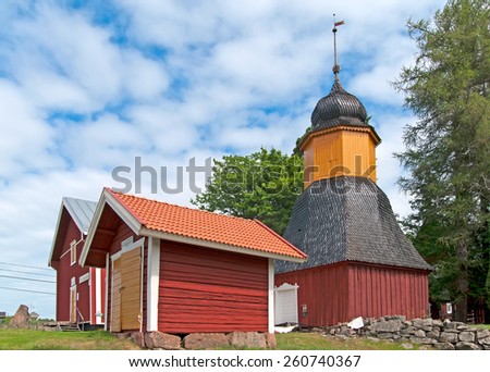 IRJANNE, EURAJOKI, FINLAND - JULY 6, 2013: Part of the museum complex in Irjanne. On the right side is belfry. Left side is a storage and a small fire station