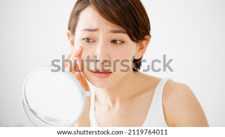 Similar – Image, Stock Photo Young woman with eyes closed standing near wall