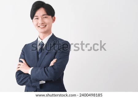 Similar – Image, Stock Photo Stylish man in suit walking on pavement with electric bike