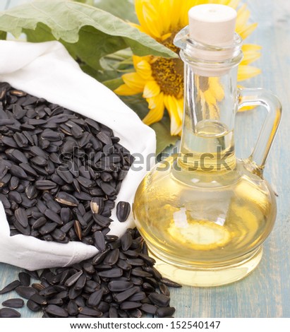 Sunflower seeds in the bag, and sunflower oil in a bottle