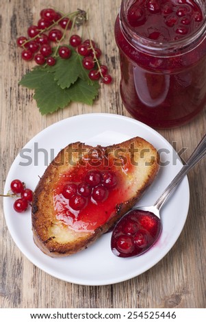Red currant jam and toast with jam.