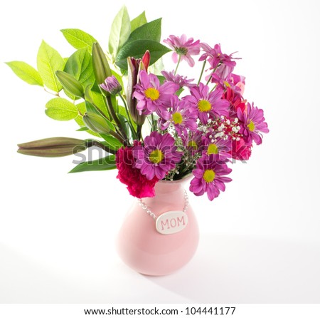 Pretty pink flowers in pink Mother's Day vase for mom