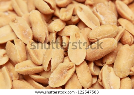background of roasted peanuts with salt