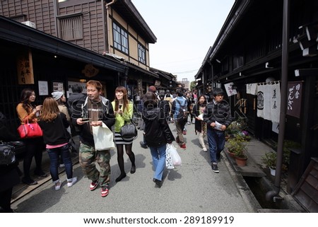 TAKAYAMA, JAPAN - APRIL 14: Unidentified people at  the old town area in Takayama Japan on March 14, 2015