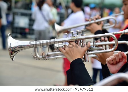 the musician playing trumpet