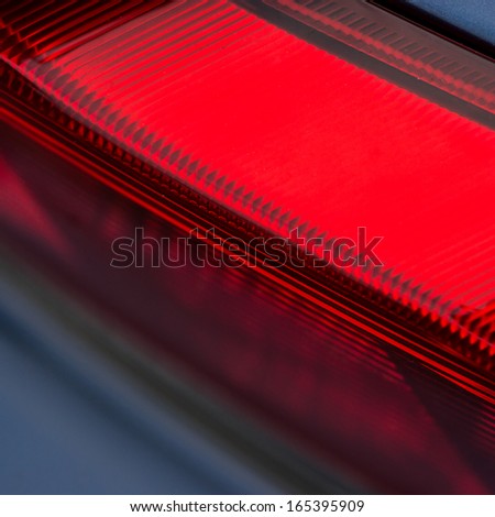 A macro abstract shot of a car brake light.