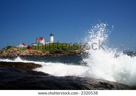Nubble lighthouse with wave